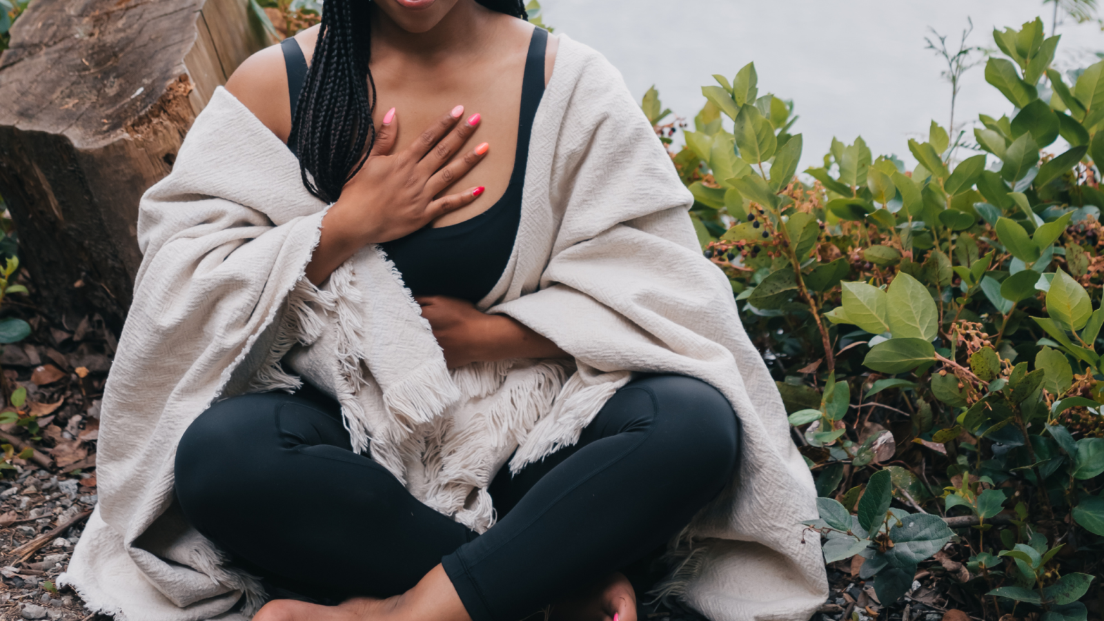 Woman practicing deep breathing to soothe panic attack
