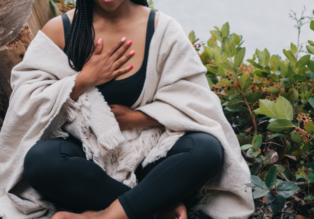 Woman practicing deep breathing to soothe a panic attack